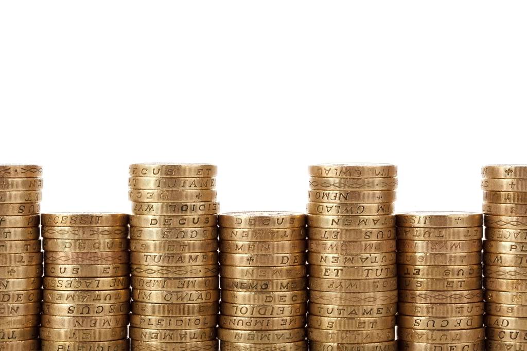 Tumpukan koin sebagai ilustrasi bonus deposit harian